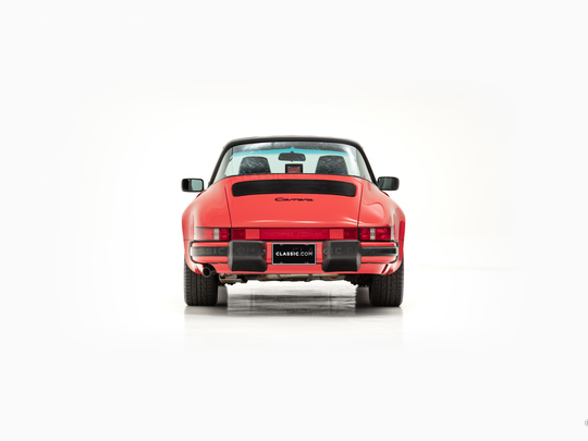 Drive Straat - 1987 Porsche 911 Carrera Targa Red  WP0EB0919HS160759 - Studio Corrected
